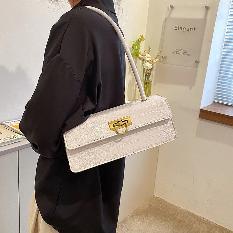 Bolsa Baguete Dourada